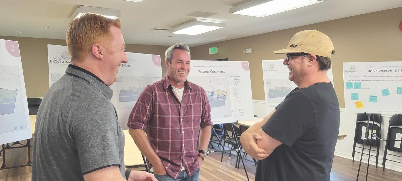 Anthony Powell, executive assistant of planning, environmental and land management (left); Alan Duckworth, environmental analyst for the Town of Rockland and project manager (center); and Jason Borowski, president of the Blue Point Civic Association (right) chat at the open house on June 9 at the Henrietta Acampora Recreation Center.